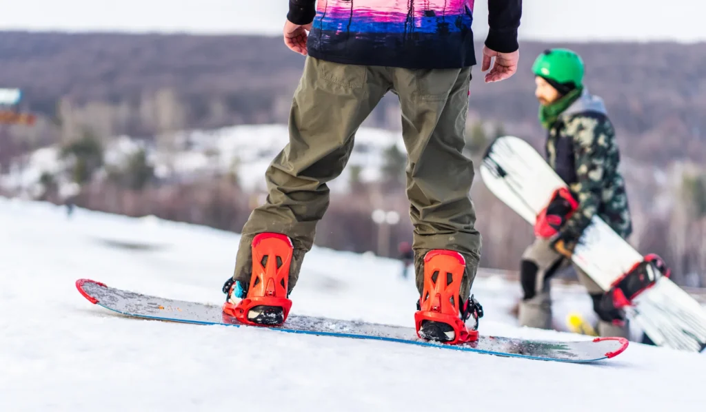 snowboarder ready to ride on snowy mountain 1